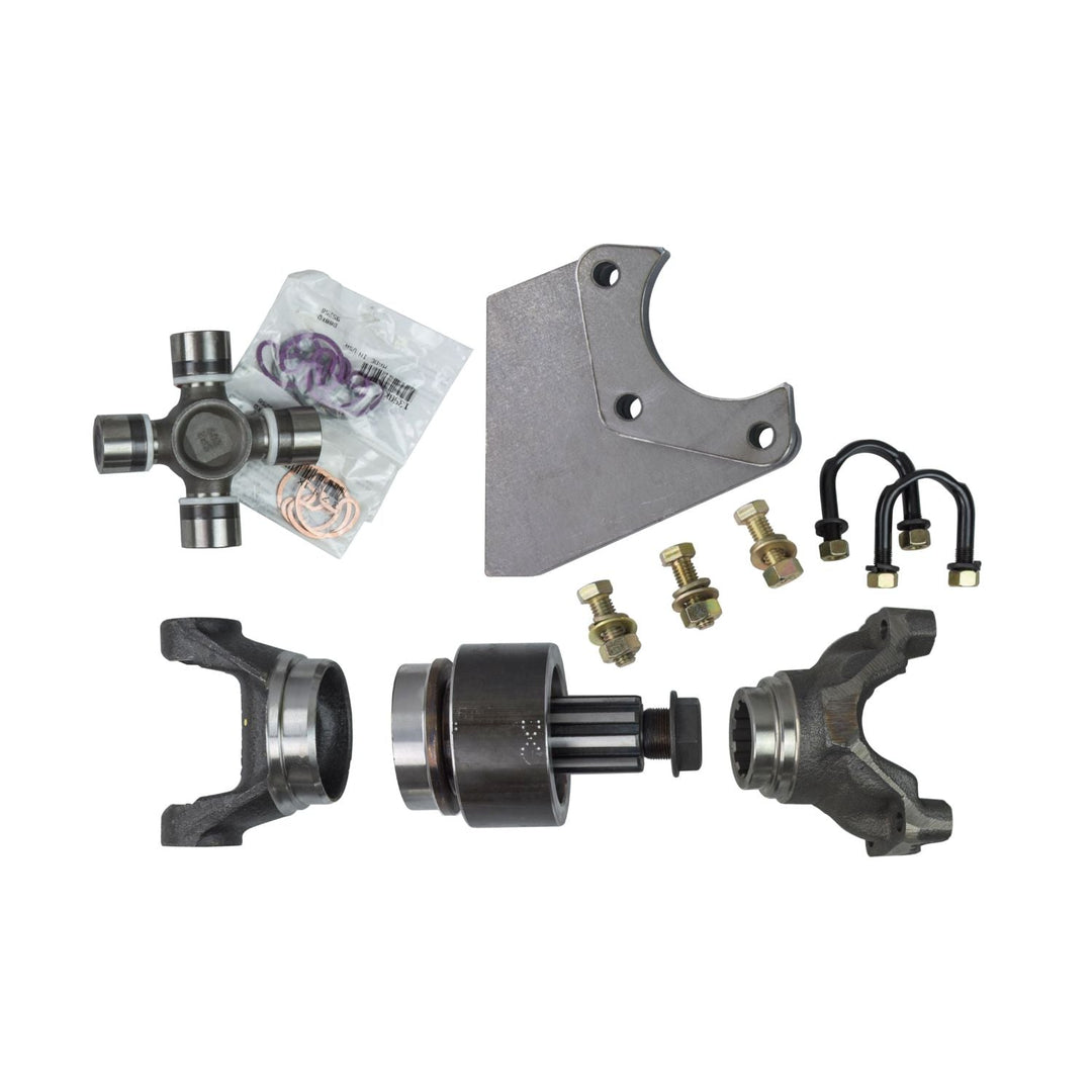Collection of 1410 carrier bearing shaft builder kit parts including a U-joint, bearings, and other components on a white background.