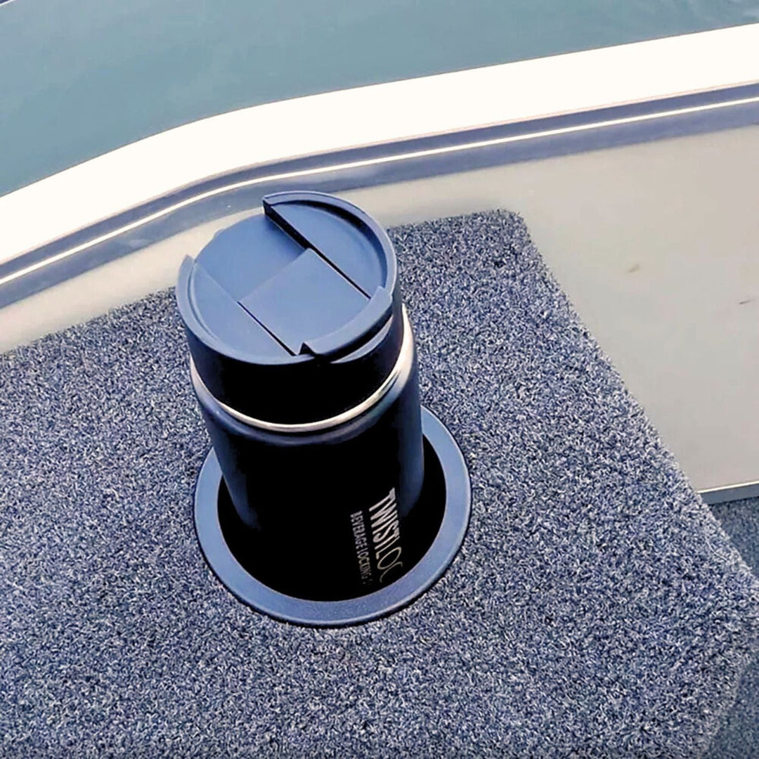 off road twist lock insulated drinkware with recessed cup holder on a boat deck with water in the background