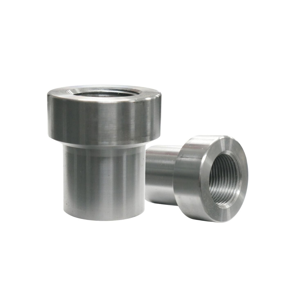 Two metal 1 1/4-12 LH weld in tube adapter on a white background