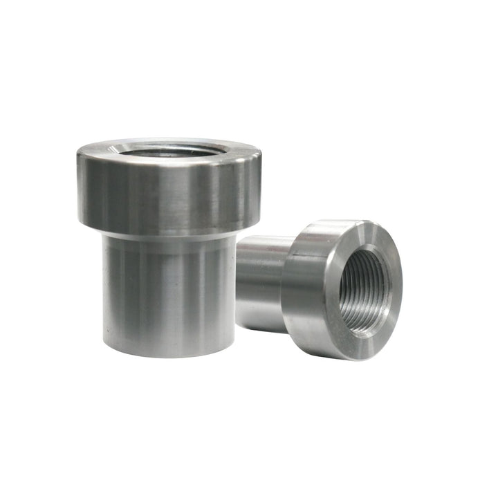 Two metal 1 1/4-12 LH weld in tube adapter on a white background