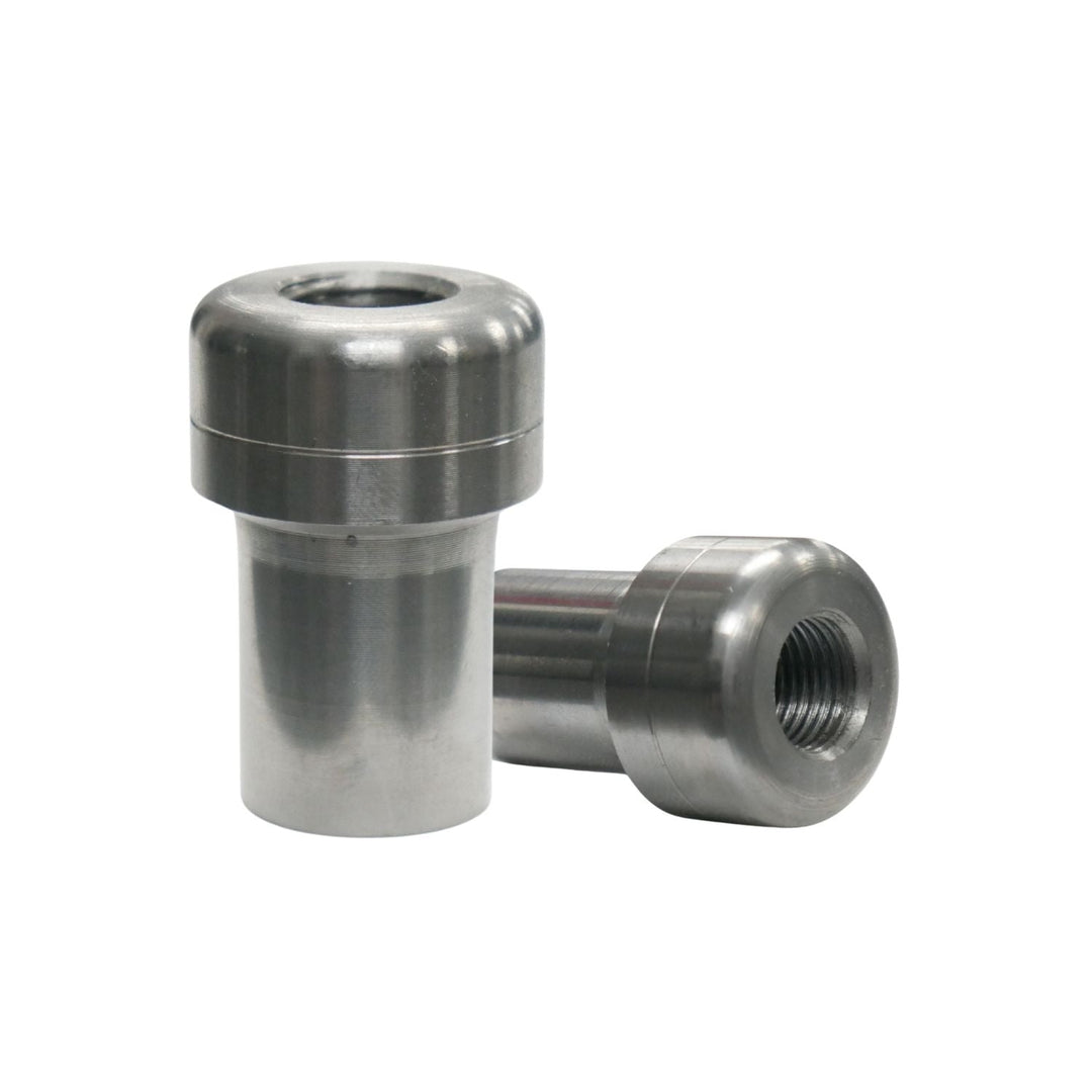 Two  1 x .120 wall weld in bungs on a white background