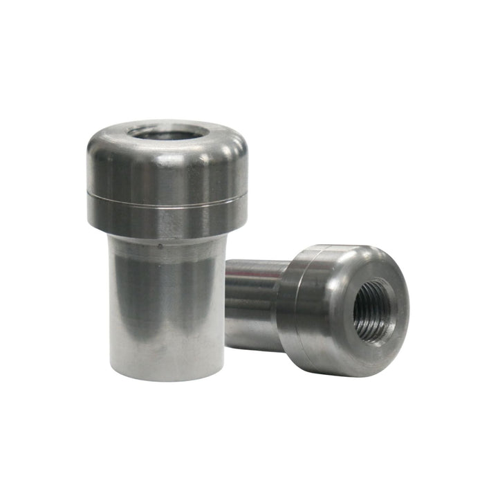 Two  1 x .120 wall weld in bungs on a white background