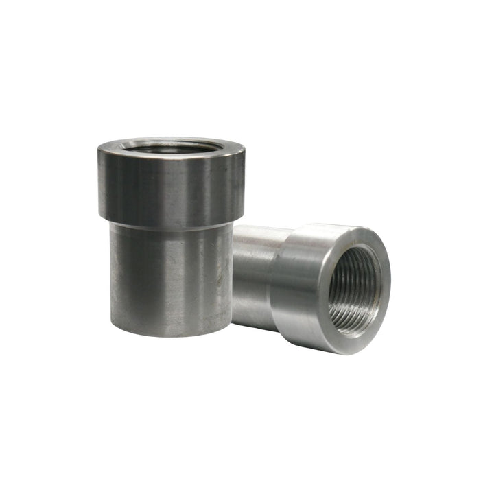 Two off-road suspension tube adapters on a white background