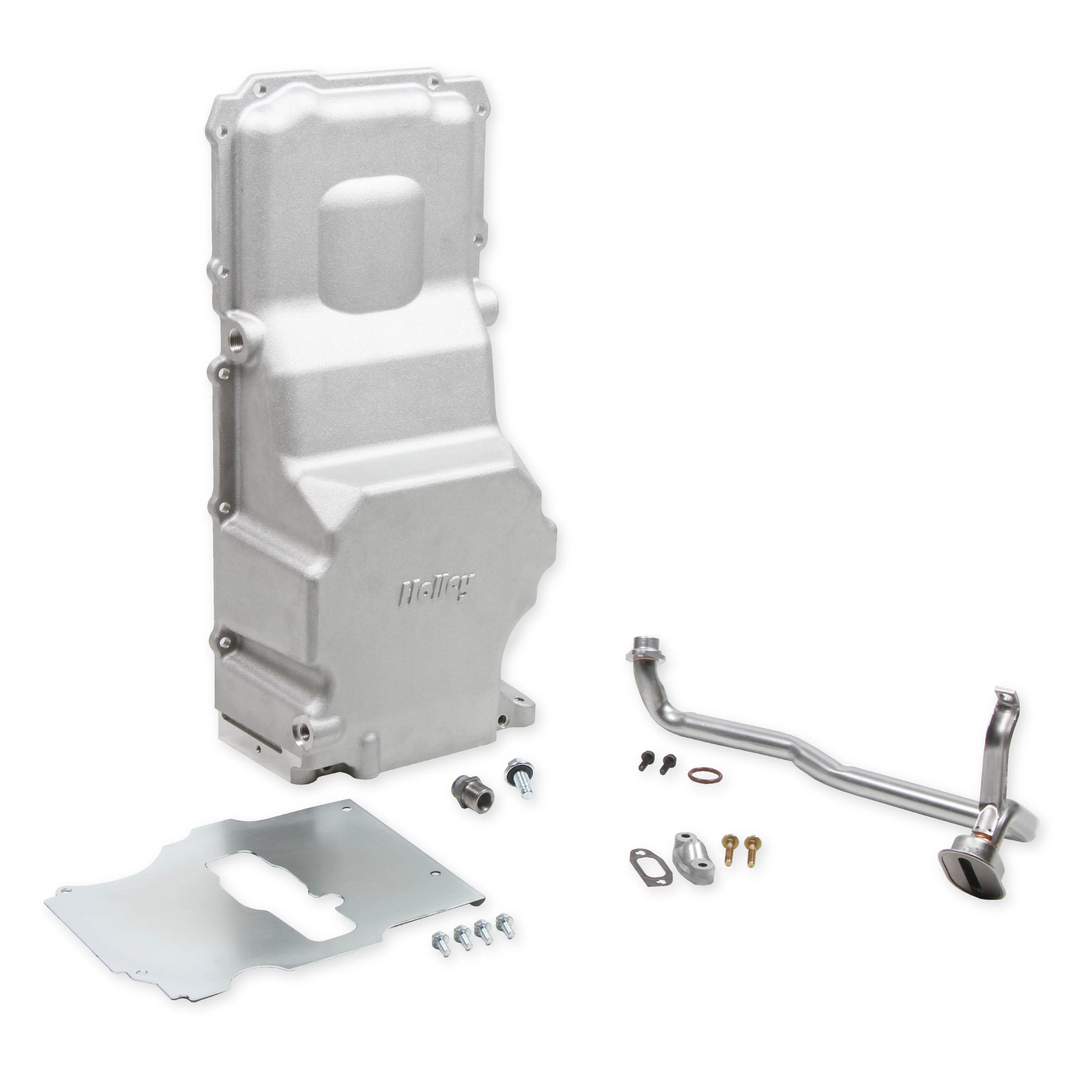 A silver Holley maximum clearance LS swap oil pan, parts and fittings on a white background