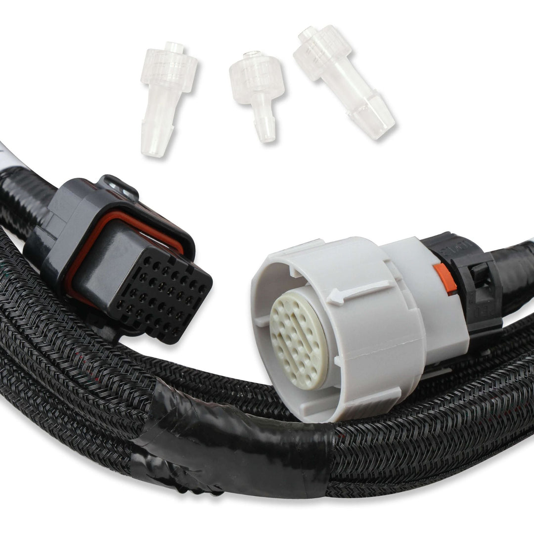 Black braided Holley Terminator X Max wiring harness with a multi-pin connector, shown with three small clear plastic connector tips on a white background.