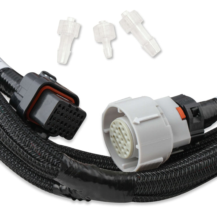 Black braided Holley Terminator X Max wiring harness with a multi-pin connector, shown with three small clear plastic connector tips on a white background.