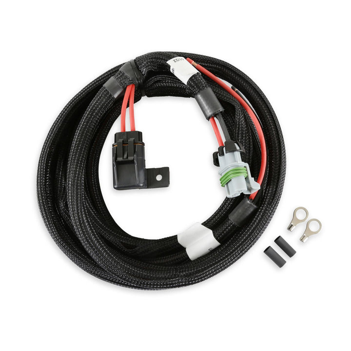 Black braided Holley EFI main power harness 558-308 with red and black wires, multiple electrical connectors, and two small metal ring terminals on a white background.