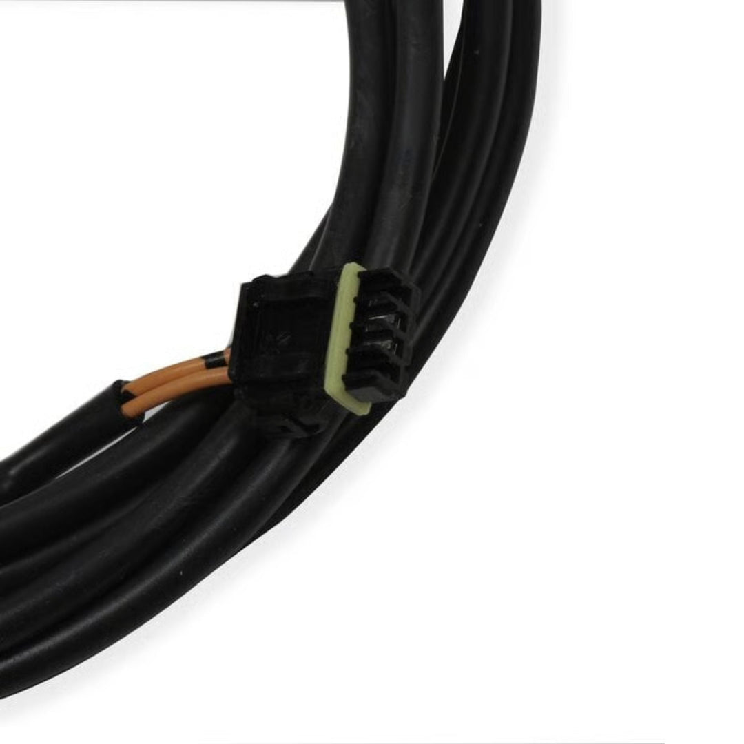A close-up of a Holley Terminator X laptop tuning cable with a black connector housing and a light green insulator, showing two exposed copper wires, on a white background.