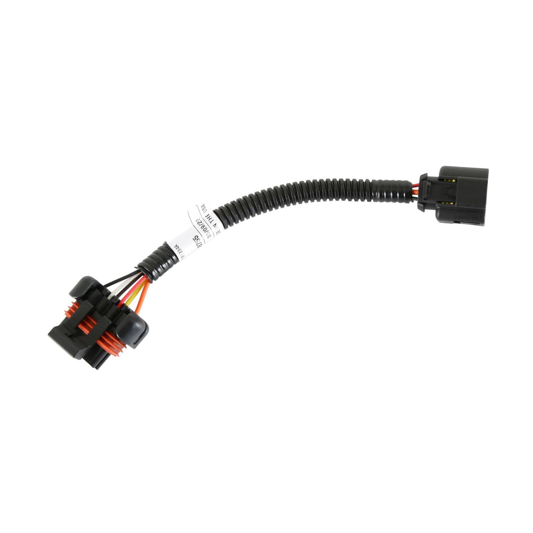 A black Holley Terminator X wideband adapter harness with a corrugated black cable, orange and red wire accents, and a white label, shown on a plain white background.