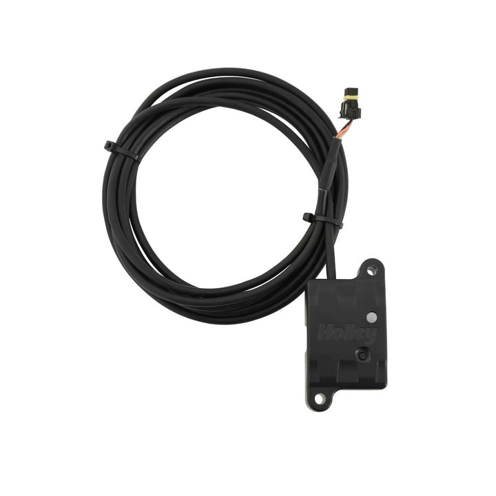 A black Holley 558-483 Bluetooth adapter with a small connector on one end and a black rectangular mounting or control module on the other, photographed on a plain white background.