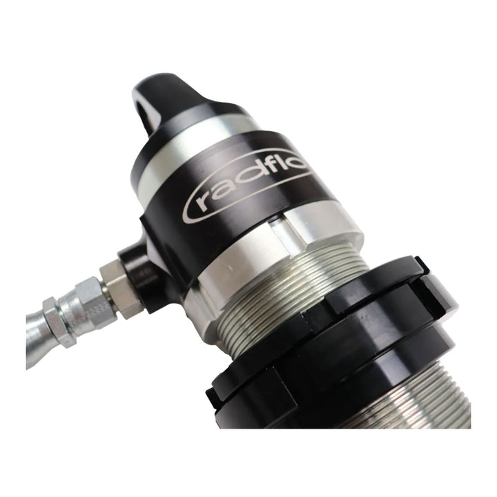 Close-up of a 2.5 internal bypass coilover shock with &