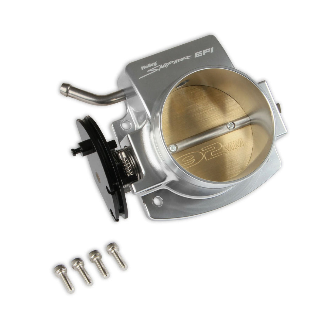 A silver 92mm throttle body for LS engine and a black linkage arm, shown with four mounting screws on a white background. The throttle body features &