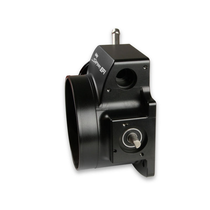 A black metal cable operated 102mm LS throttle body with connector tip and a small silver switch, shown on a white background.