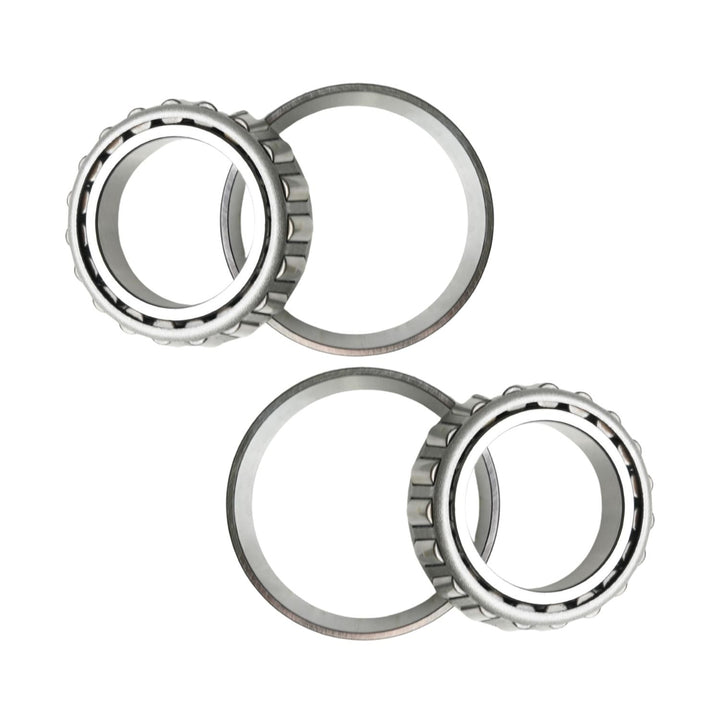 Two sets of heavy duty off-road axle bearings on a white background