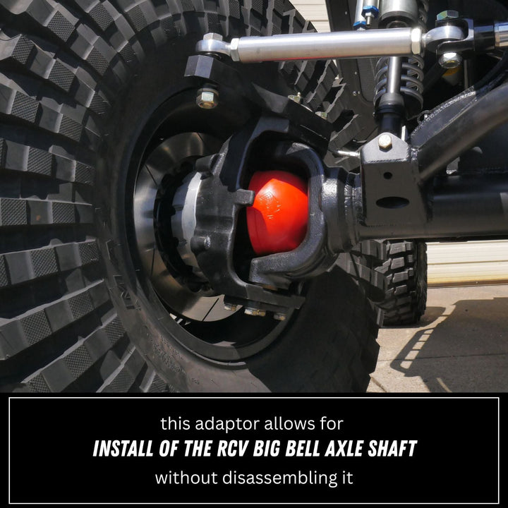 Close-up of a vehicle axle with a Rockwell knuckle to Super Duty bearing adapter for RCV Big Bell Axle Shaft installation.