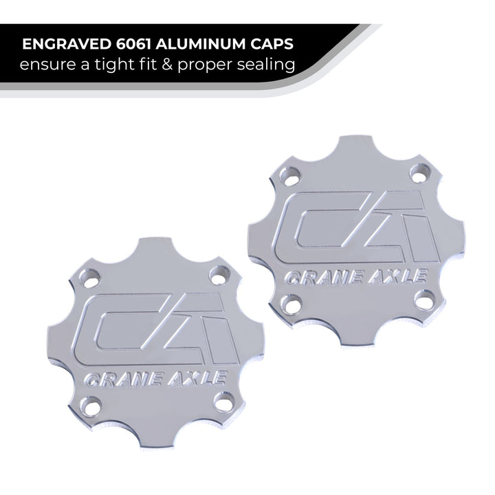 Two engraved 6061 aluminum 40 spline drive flange caps with a &