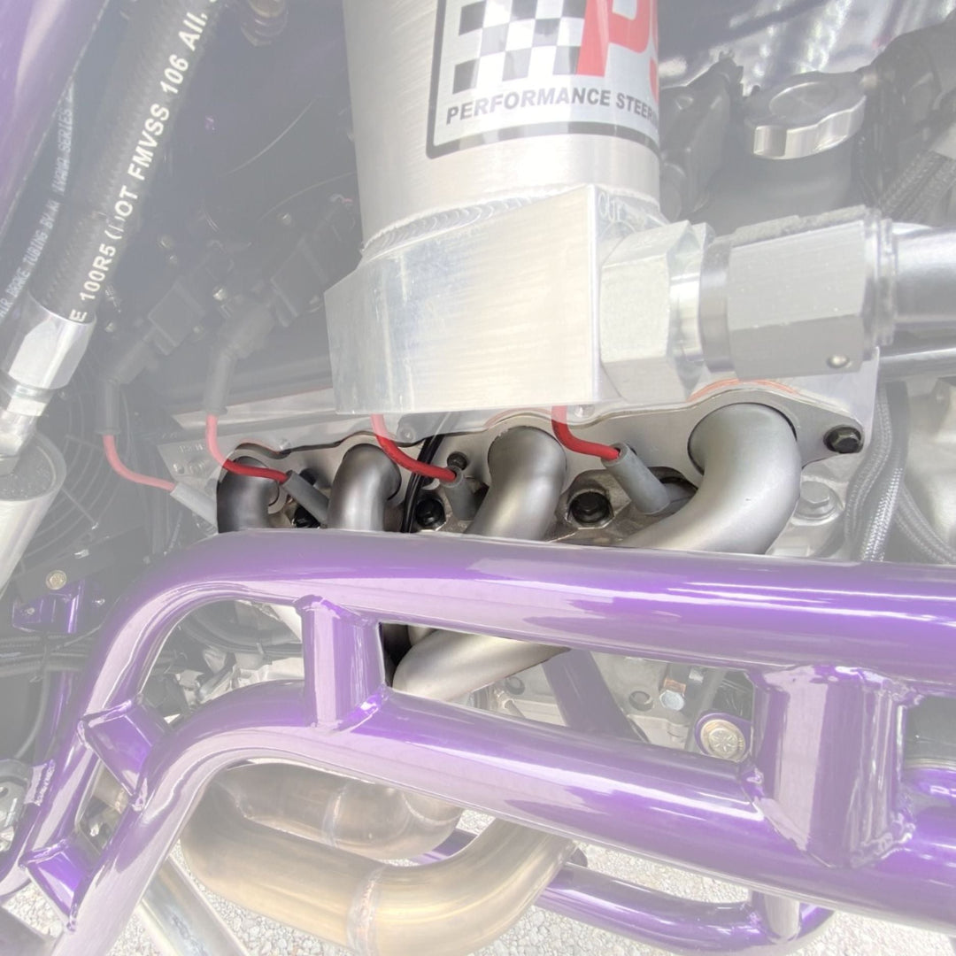 Close-up of aftermarket chassis with  LS swap headers in use