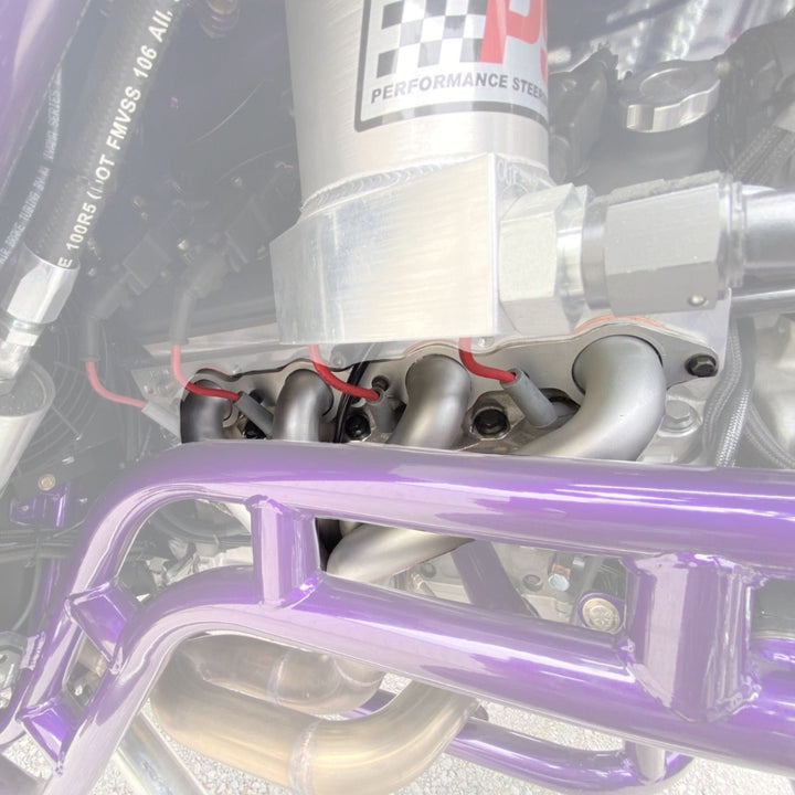 Close-up of aftermarket chassis with  LS swap headers in use