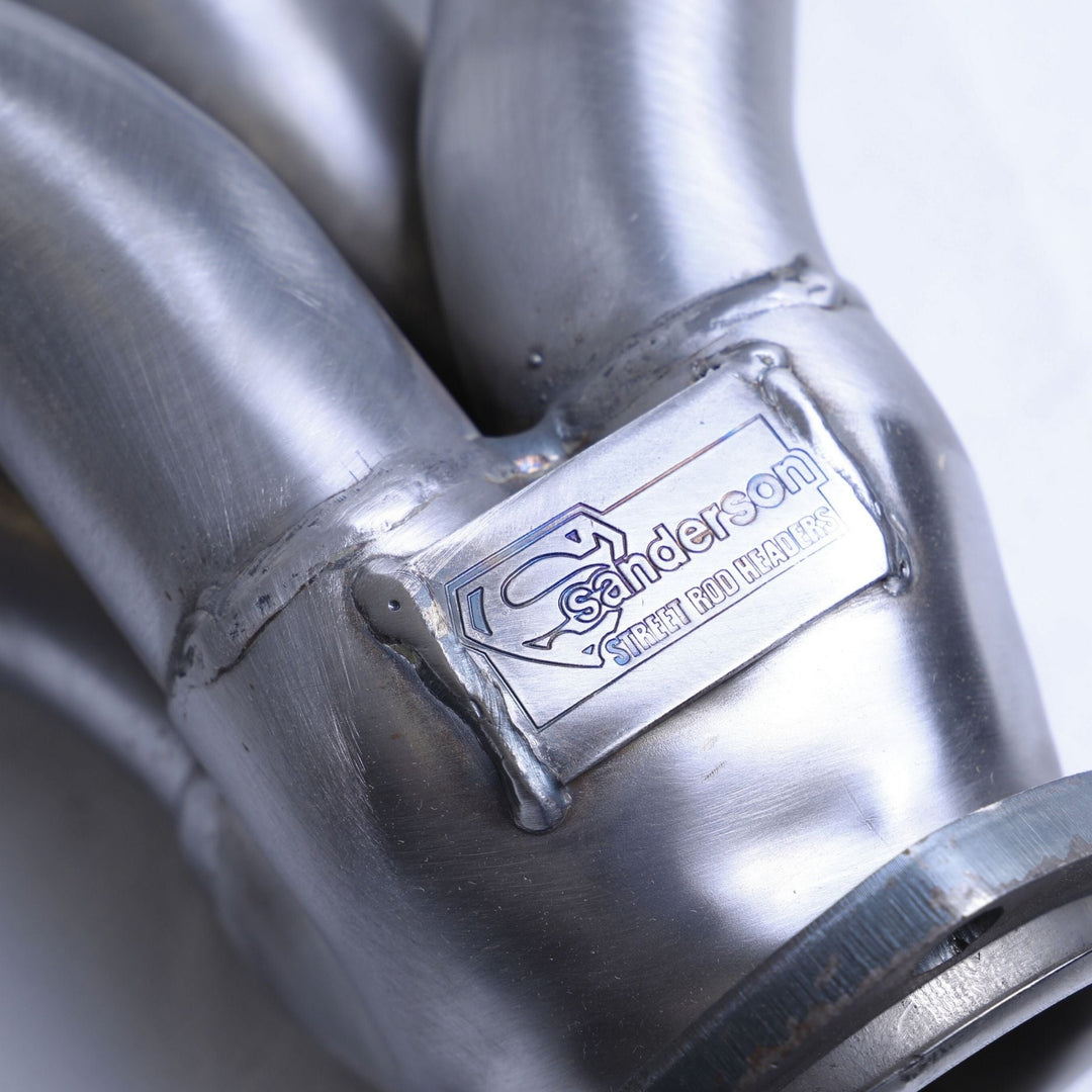 Close-up of a steel header hugger with &