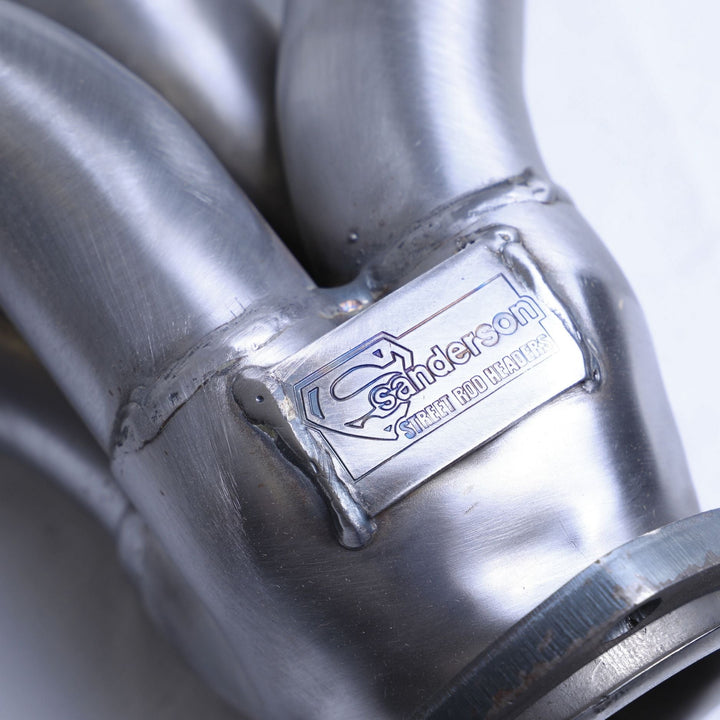 Close-up of a steel header hugger with &