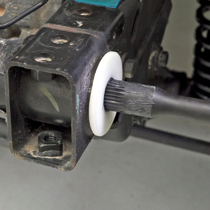 Close-up of a RockJock 25 spline AntiRock bushing in use on a sway bar