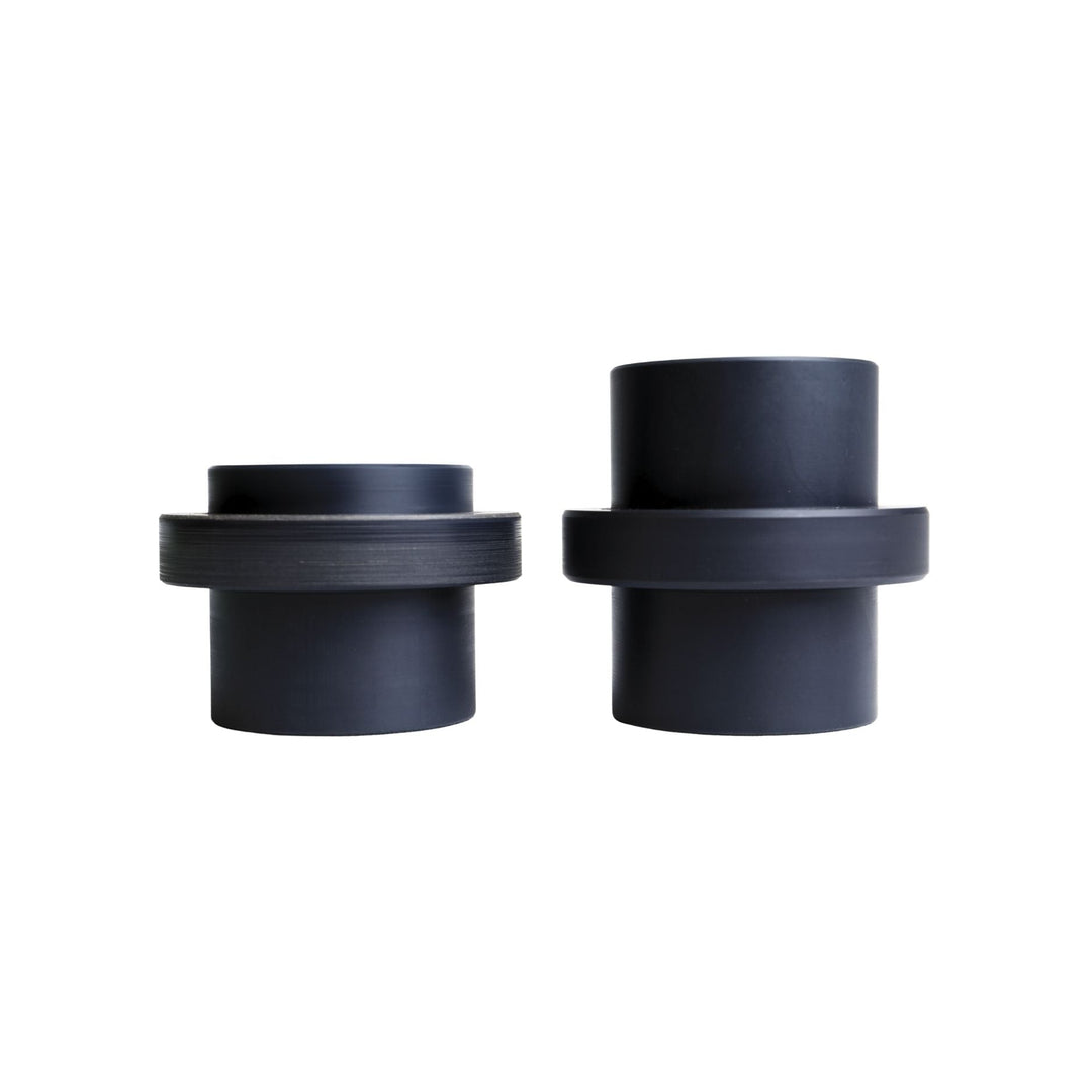 Two black Radflo 2.5 dual rate sliders with concentric rings on a white background