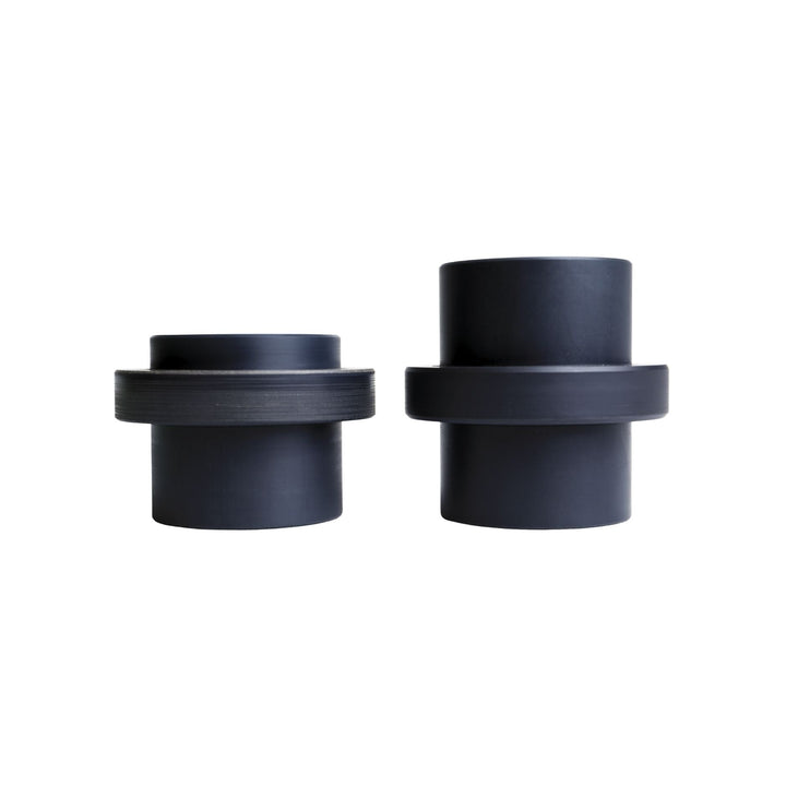Two black Radflo 2.5 dual rate sliders with concentric rings on a white background
