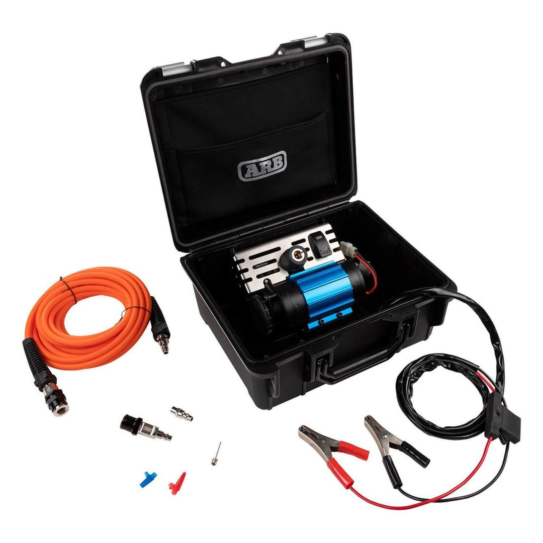 trail air up compressor with carry case and accessories on a white background