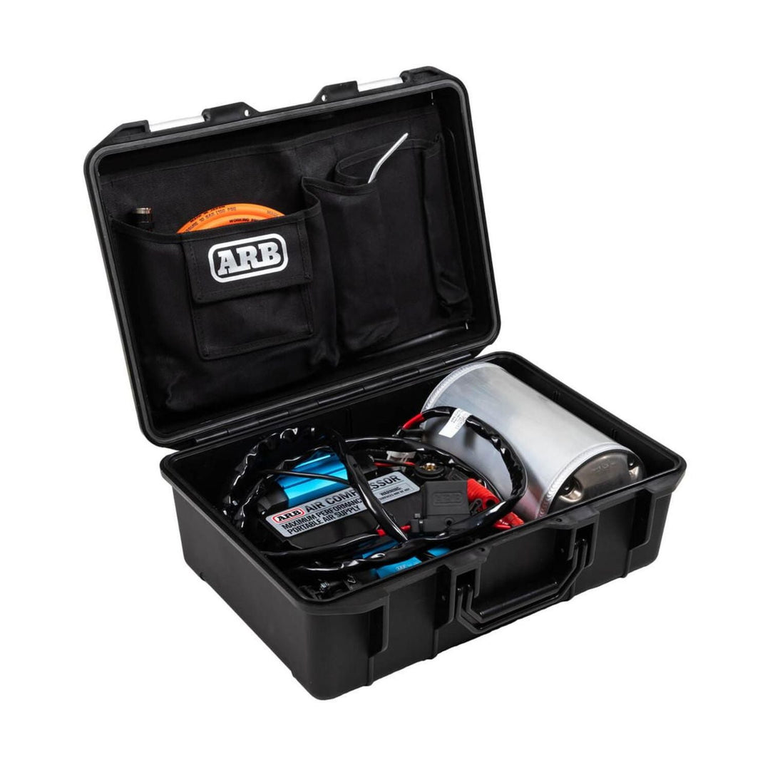 High output off-road air compressor ARB in a Black toolbox with ARB branded items on a white background