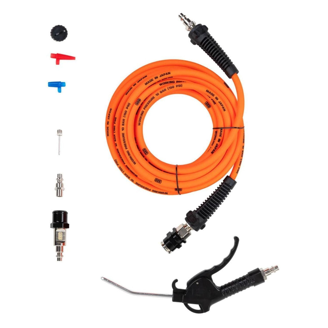 CKMTP12 portable air compressor 100% duty cycle kit with orange air hose and various attachments on a white background
