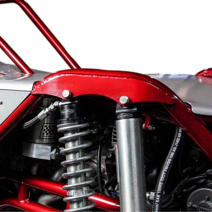 Close-up of laser cut weld on shock tabs in use on an off road chassis