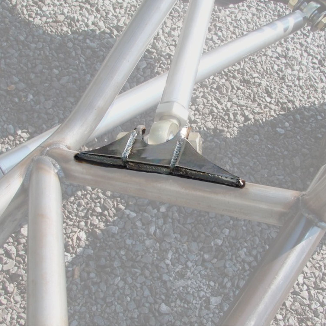 Close-up of fabrication chassis link brackets welded on a chassis