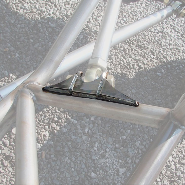 Close-up of fabrication chassis link brackets welded on a chassis