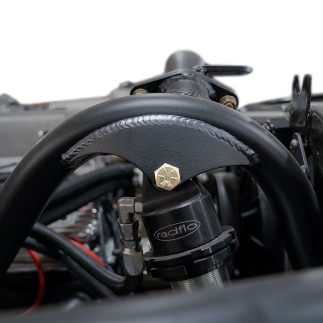 Close-up of  1/4 inch weld on shock mounts in use on an off road vehicle