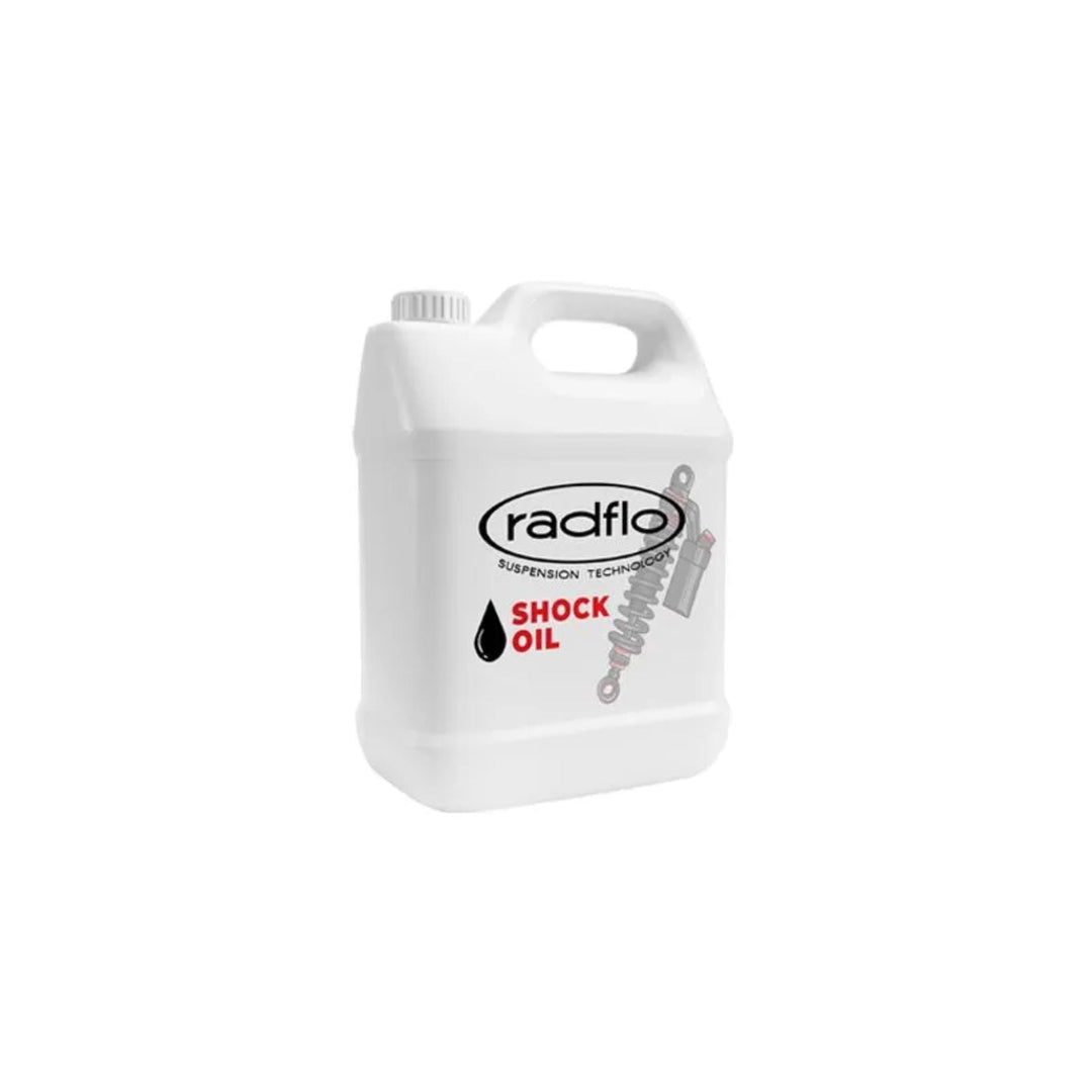 Container of radflo 5W shock oil on a white background
