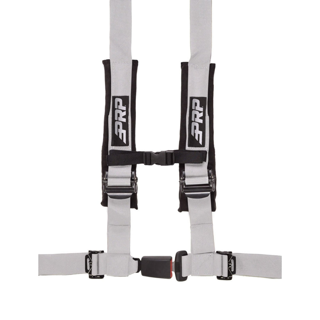 Silver 4-point racing harness with  automotive buckle style latch and PRP logo on a white background