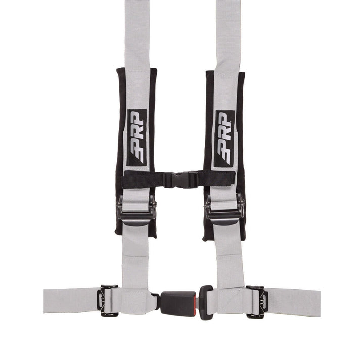 Silver 4-point racing harness with  automotive buckle style latch and PRP logo on a white background