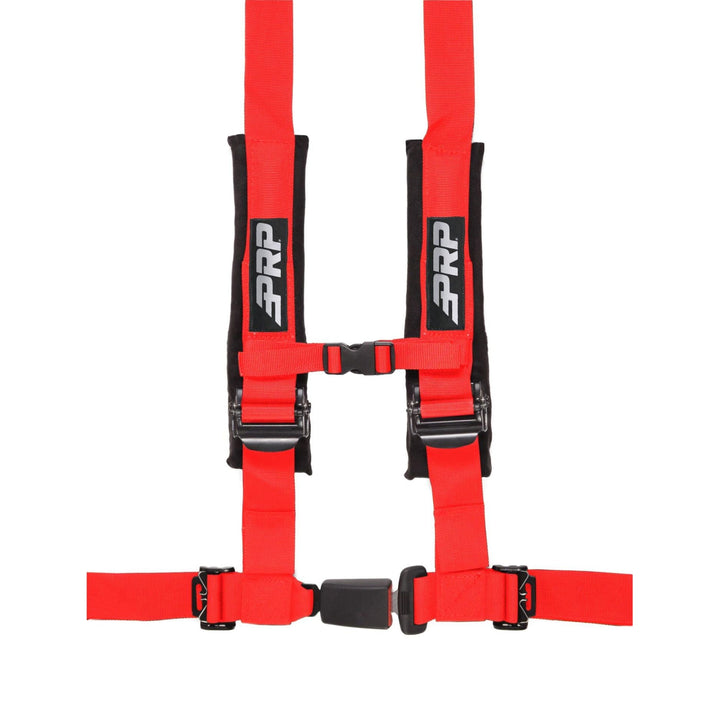 Red 4-point racing harness with  automotive buckle style latch and PRP logo on a white background