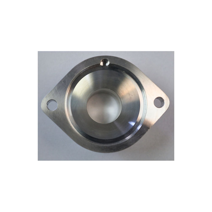 Corvette LS thermostat housing upgrade on a gray background