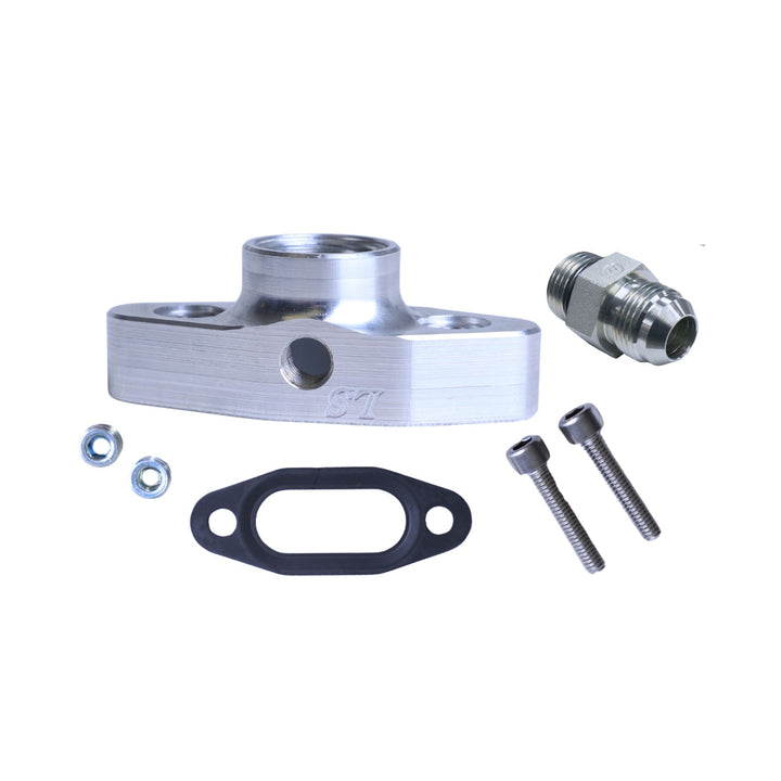 LS oil pressure accumulator plumbing with bolts and gaskets on a white background