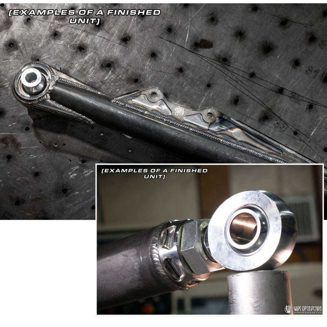 Close-up of rock crawler long travel trailing arm on a metal surface with text indicating examples of a finished unit.