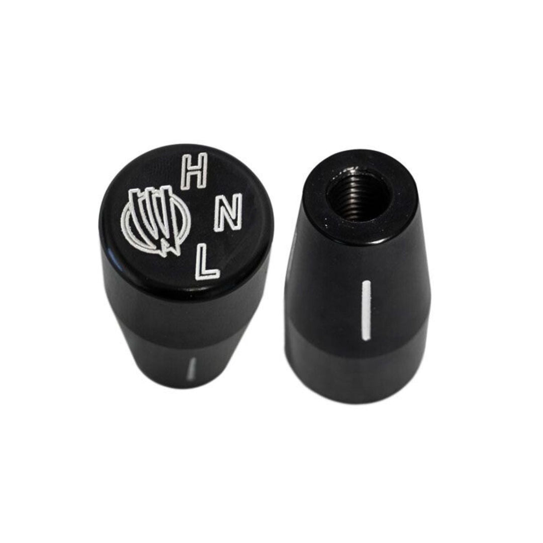 Two black transfer case shifter knobs with 'HNL' reverse pattern on a white background