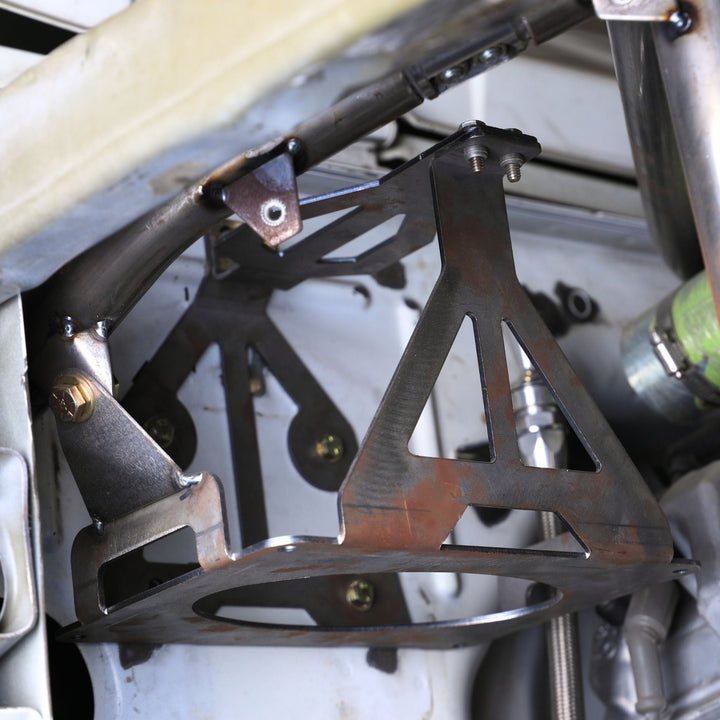 Optima Battery Mounting Tray installed on a vehicle with suspension components