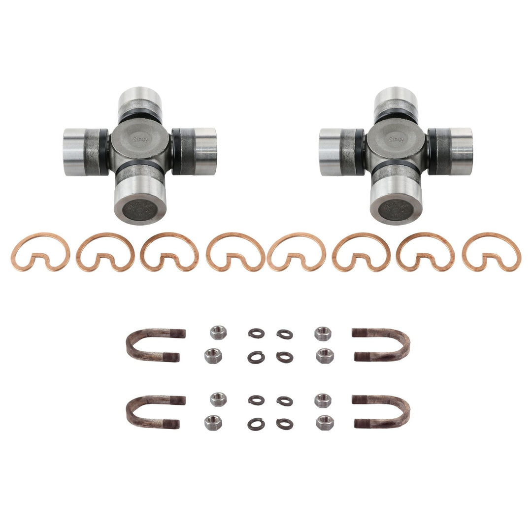 Two Spicer 1480 u- joints with washers and small metal parts on a white background