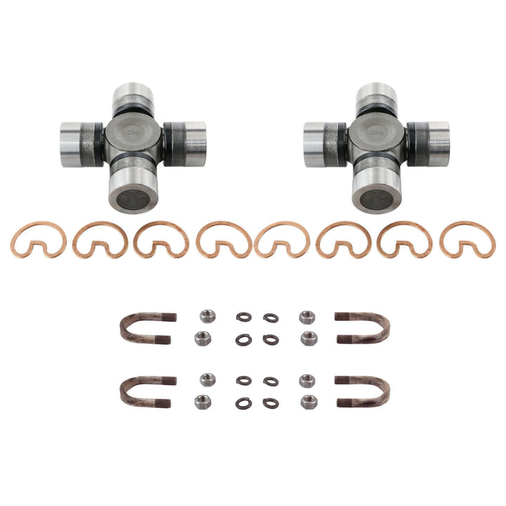 Two Spicer 1480 u- joints with washers and small metal parts on a white background