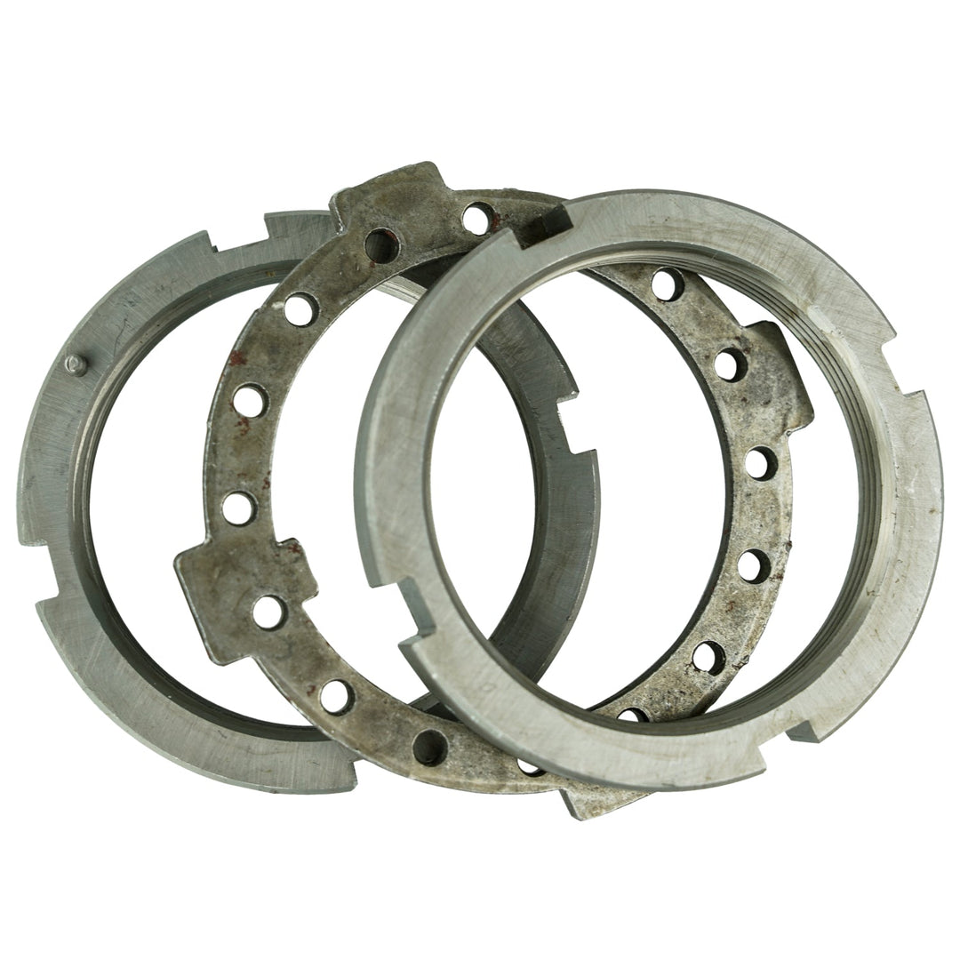 dana 60 spindle nut replacement kit components stacked on a white background