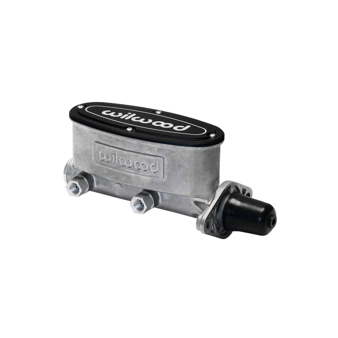 A Wilwood 1-1/8 tandem master cylinder with a silver aluminum body, a black top cap featuring the white Wilwood logo, and a black master cylinder hose, shown on a plain white background.