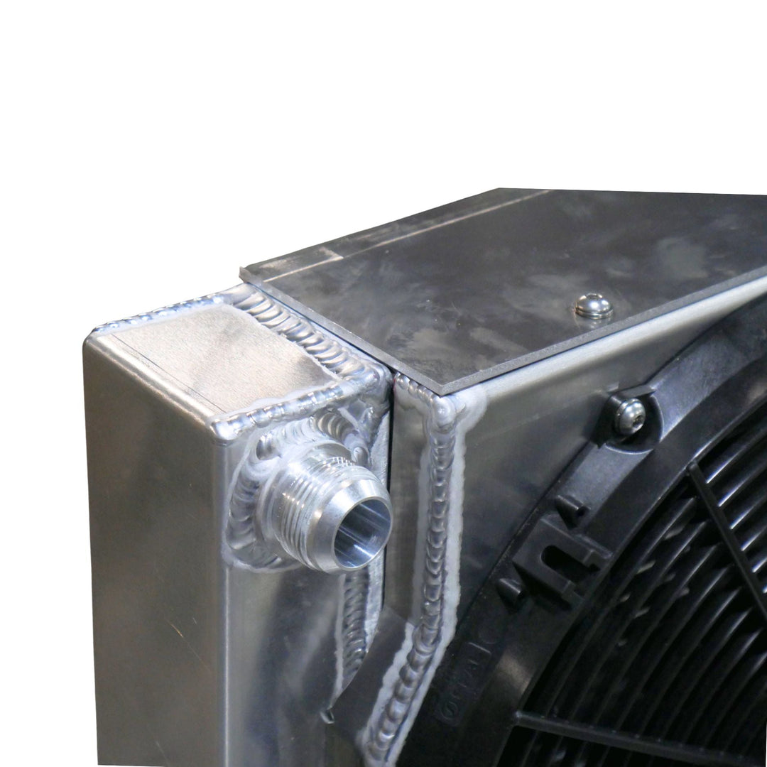 Close-up of a weld on LT engine aluminum radiator combo for rock crawler on a white background