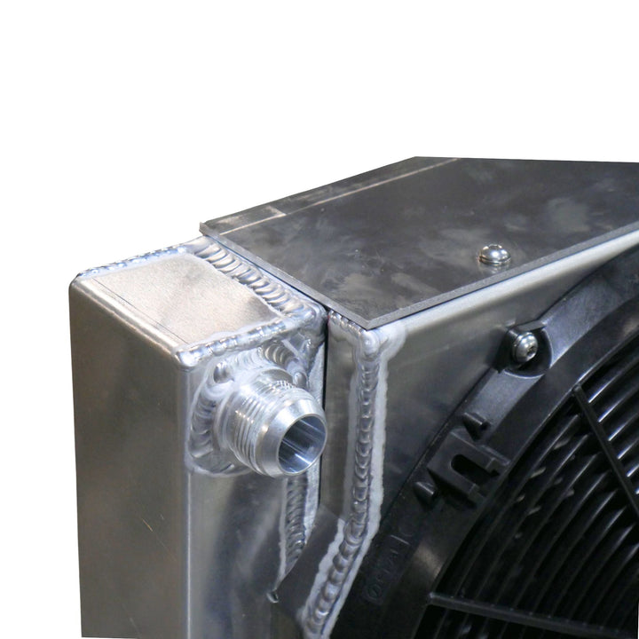 Close-up of a weld on LT engine aluminum radiator combo for rock crawler on a white background