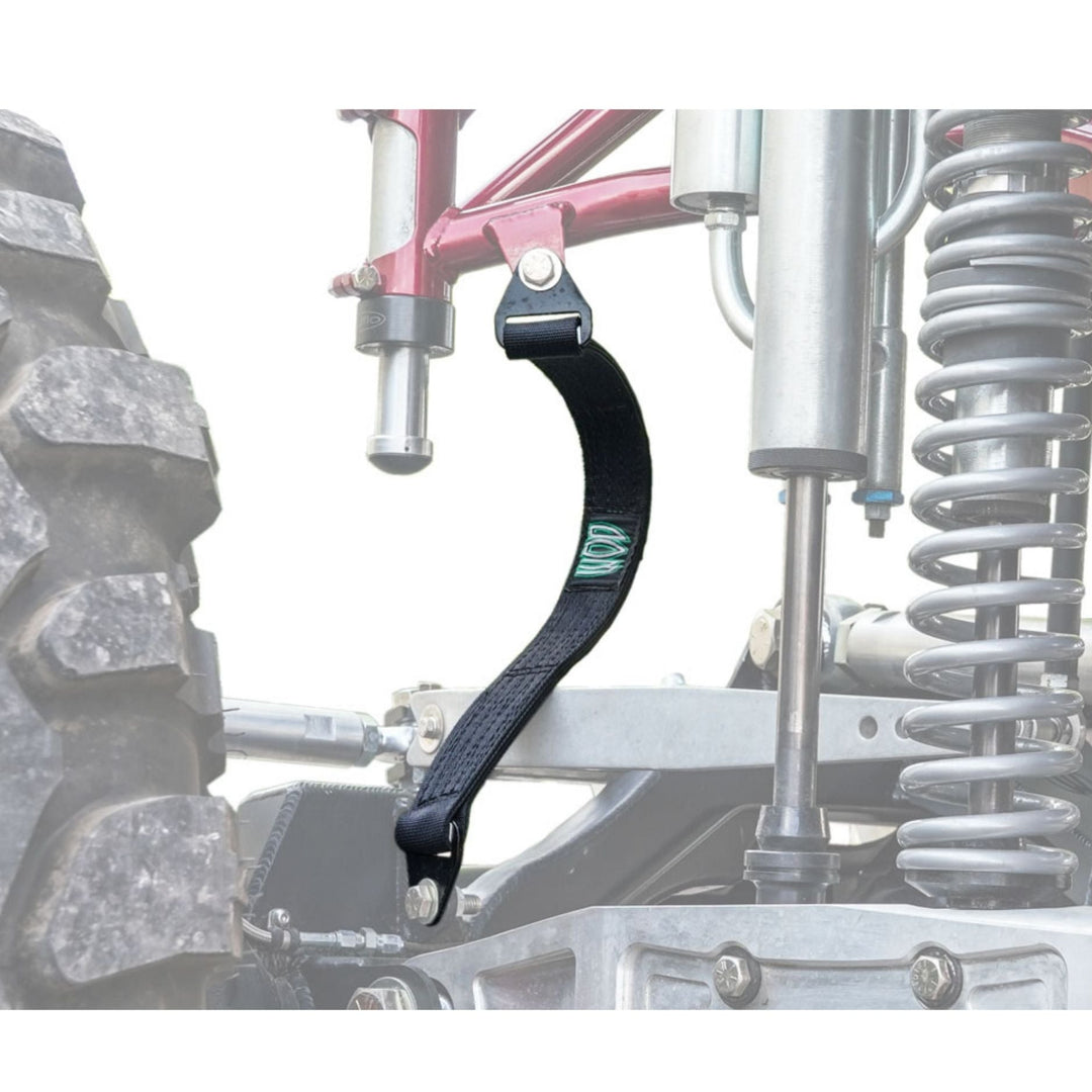 Black rock crawler limit straps attached to an off road vehicle&